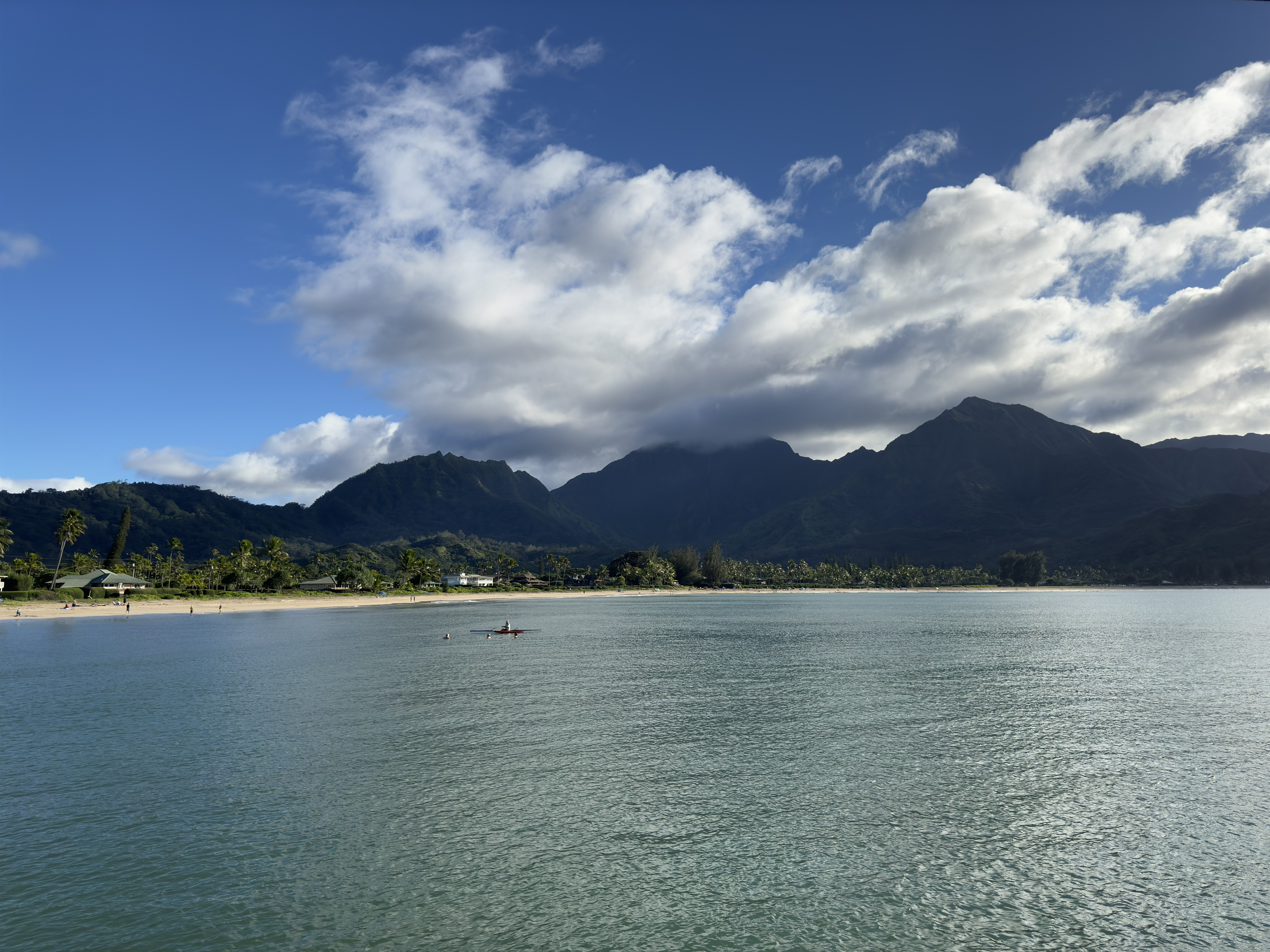 Hanalei Bay with scenic mountain backdrop on the north shore of Kauai.